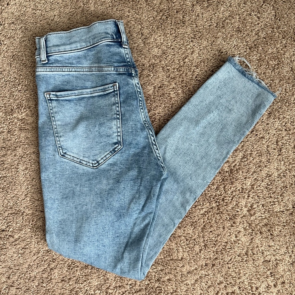 Express High Waisted Light Wash Skinny Jeans.